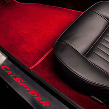 CalSpyder Black Interior with Red Floor Mats